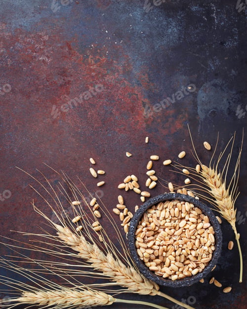 Preview: Wheat grains and spikelets on rusty background