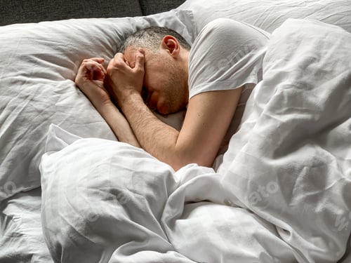 Preview: Middle aged adult man sleeping at home Cozy bedroom bed vibes white bedsheets Alone Early morning