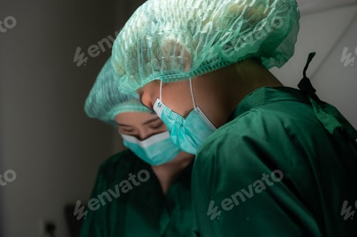 Preview: professional surgeon doctor team are working for surgery in medical operating room at hospital