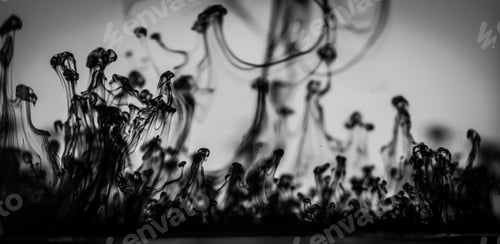 Preview: Greyscale shot of beautiful patterns formed from the black smoke