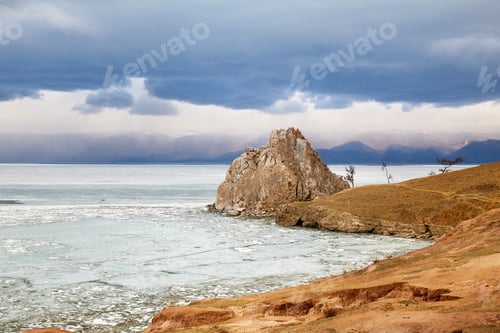 Preview: Beautiful view of Cape Burkhan on Olkhon Island on a cloudy spring day.