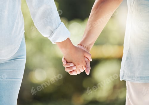 Preview: Love is a beautiful thing. Cropped shot of an unrecognizable couple holding hands.