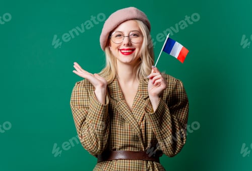 Preview: beautiful woman in style jacket and hat with French flag