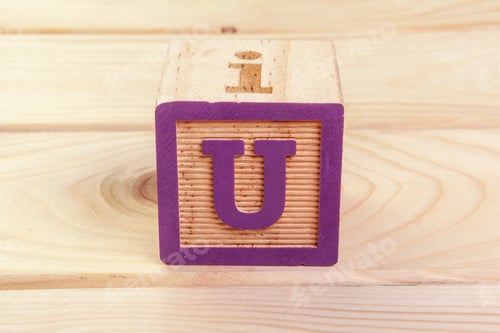 Preview: wooden block alphabet lay on wooden floor. Creative Photo