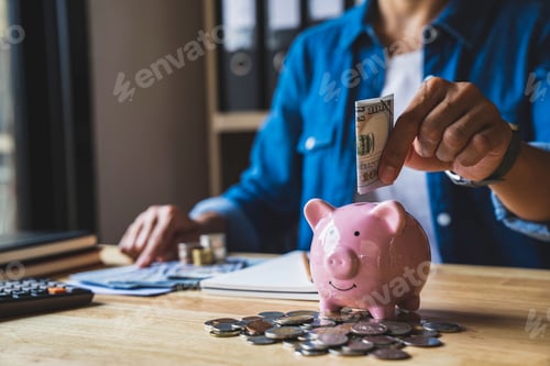 Preview: Woman folds dollar bills into pig piggy bank to save money for the future. after retirement and reco