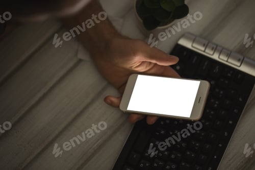 Preview: Businessman hand holding smart phone. Mobile Phone