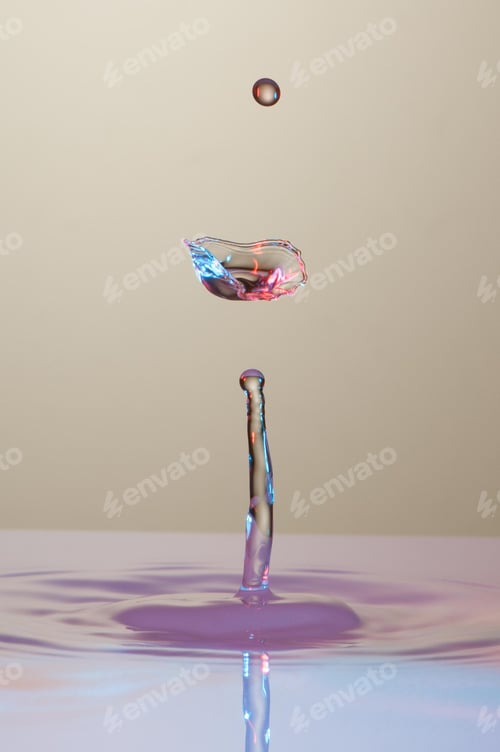 Preview: Splash of colorful liquid with high speed flash