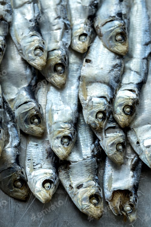 Preview: Overhead view of dried sardines.