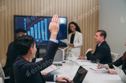 Preview: Businesspeople discussing during meeting in conference room. Clean Energy Discussions.