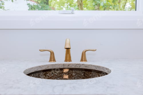 Preview: Close up of sinks in modern bathroom in designed luxury apartment white stone