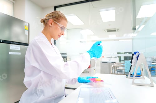 Preview: Scientist conducts analysis in modern laboratory focused on research and experimentation