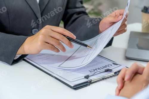 Preview: Office executives hand holding pen and interviewing job applicants in the meeting room.