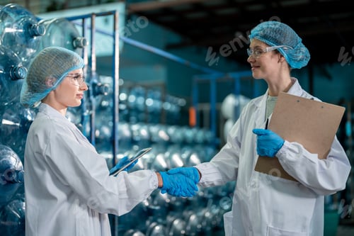 Preview: Caucasian female scientist working in laboratory at factory warehouse.
