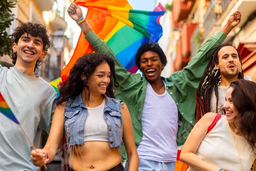 Preview: Young activists marching with rainbow flag for lgbtq plus rights