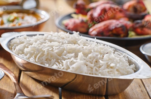 Preview: indian basmati rice in metal bowl with roasted cumin seeds