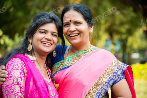 Preview: Portrait of happy mother and daughter embracing.