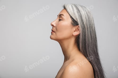Preview: Beauty portrait of an attractive mature topless woman