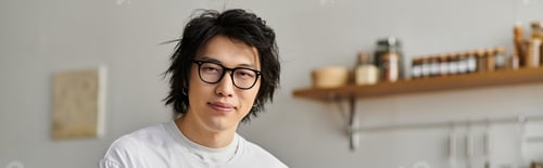 Preview: Handsome young man enjoying a moment at home in his modern apartment