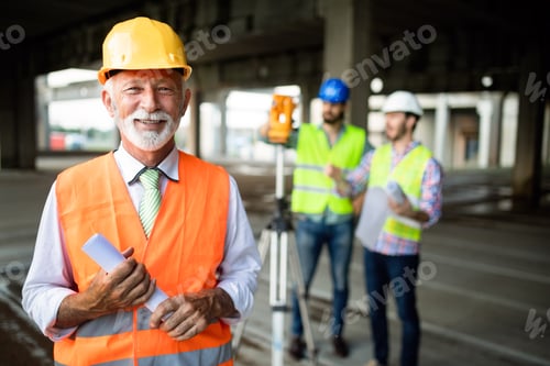 Preview: Engineer, foreman and worker discussing in building construction site