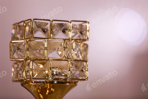 Preview: festive wedding table decoration with crystal gold candlesticks and candles. wedding day.