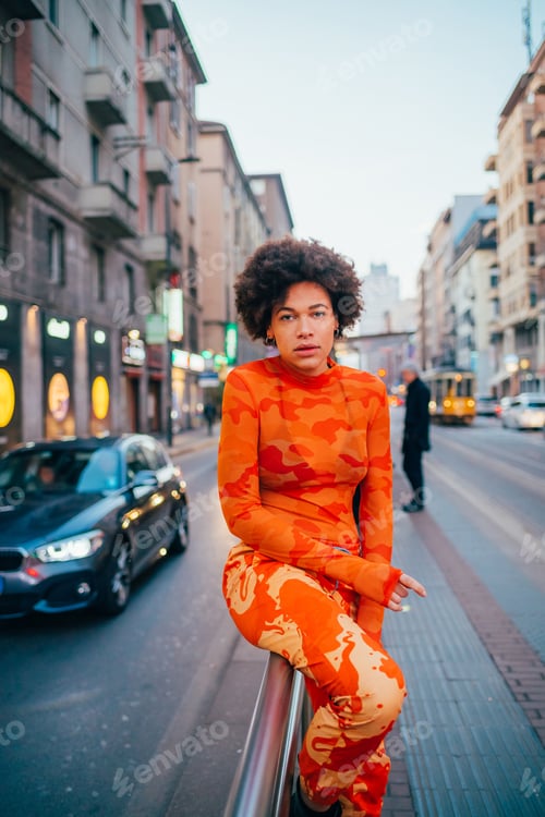 Preview: Young mixed race woman outdoor posing outdoor