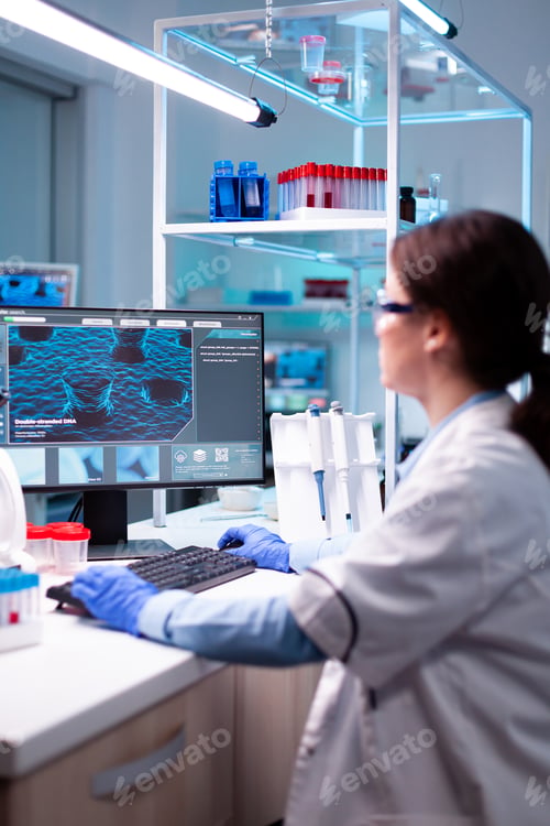 Preview: Woman scientist engineering virus in biochemistry laboratory