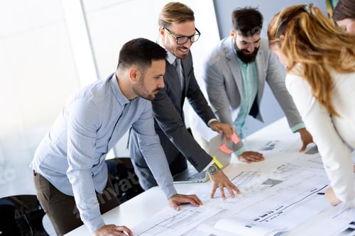 Preview: Group of architects and business people working together and brainstorming