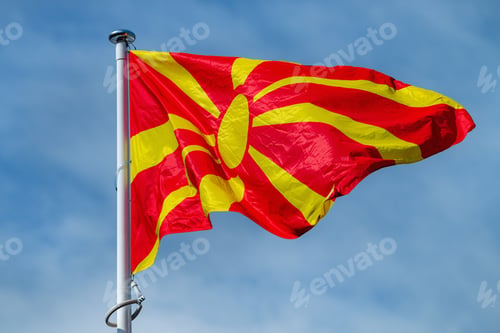 Preview: The national flag of Serbia waving in the blue sky