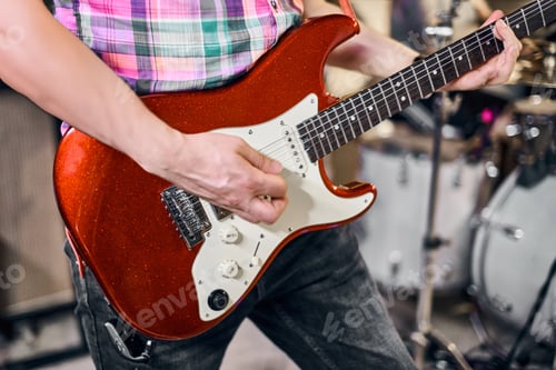 Preview: Energetic band rehearsal with electric guitar focus