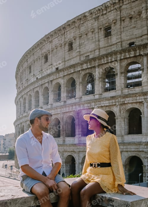 Preview: Couple visit the Colosseum in Rome at a citytrip in Rome Italy, Europe