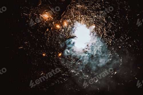 Preview: Luminous firecrackers spinning sparks of fire.