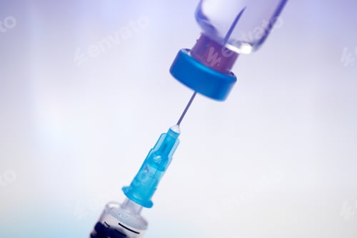 Preview: Close up on vaccine and medical syringe