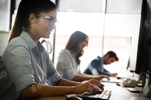 Preview: Programmers cooperating at IT company developing apps
