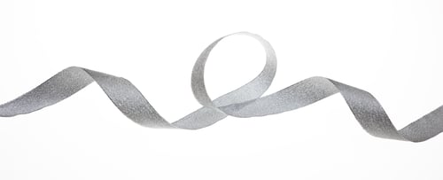 Preview: Christmas decoration, gift Xmas present concept. Silver curly ribbon isolated on white background