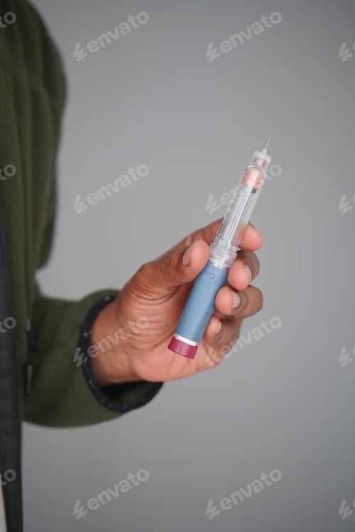 Preview: Holding a medical injection device for diabetes management