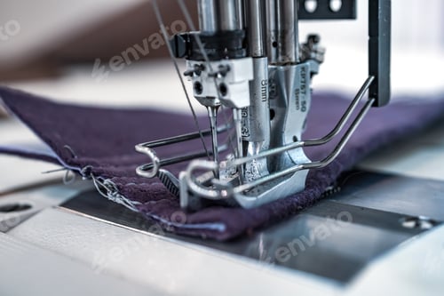 Preview: Professional sewing machine close-up. Modern textile industry.