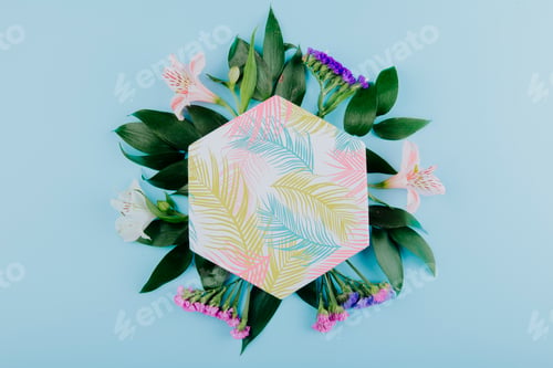 Preview: top view of a gift box with pink alstroemeria flowers and purple statice with ruscus