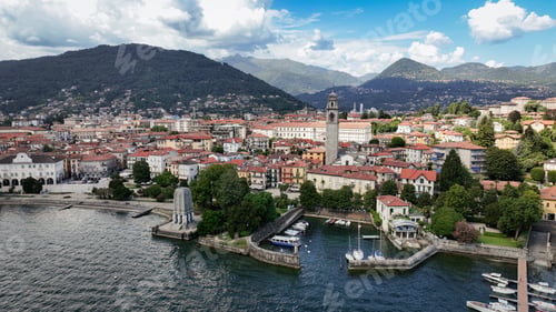 Preview: Beautiful view of Verbania, Italy with mountains and waterfront scenery during the day