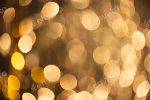 Preview: Yellow bokeh lights with copy space on dark background