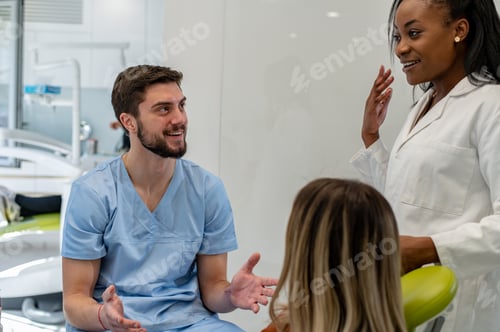 Preview: Dentist and patient talking about treatments in a consultation