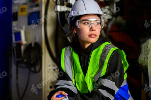 Preview: Professional maintenance worker working with robotic arms machine