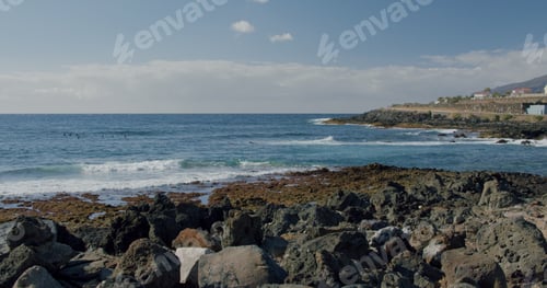 Preview: Black rocky volcanic beach with black lava stones. Puerto de la Santiago, Tenerife. Punta Blanca or