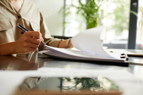 Preview: Woman doing paper work