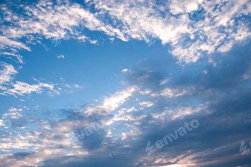 Preview: Blue sky with clouds and sun.
