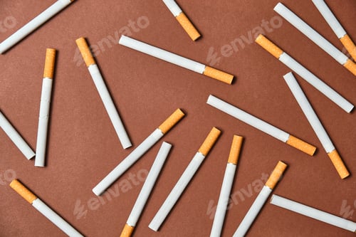 Preview: image from above of a pile of unlit cigarettes