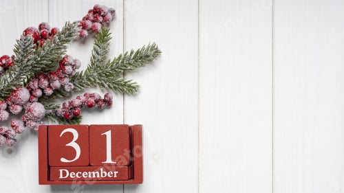 Preview: New Year Background with Decorated Fir Tree and Red Perpertual Calendar. Top view, copy space