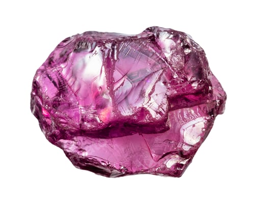 Preview: unpolished rhodolite mineral isolated on white