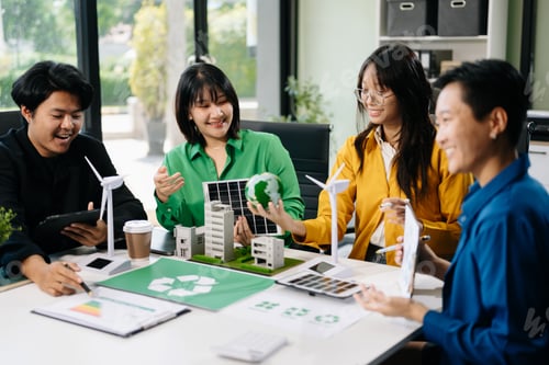 Preview: Asian professionals collaborate on sustainable energy solutions with wind turbines, solar panels,