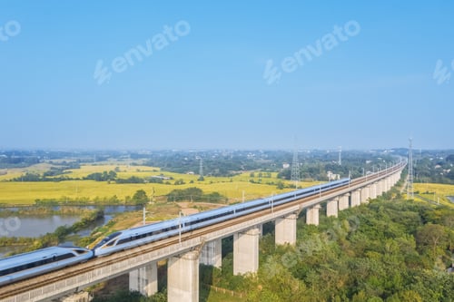 Preview: aerial view of high speed trains in rural autumn landscape