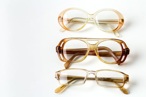 Preview: Different styles of glasses arranged in a simple row on a white background